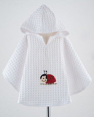 PONCHO MIT ABGERUNDETEN ECKEN