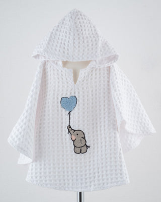 PONCHO MIT ABGERUNDETEN ECKEN