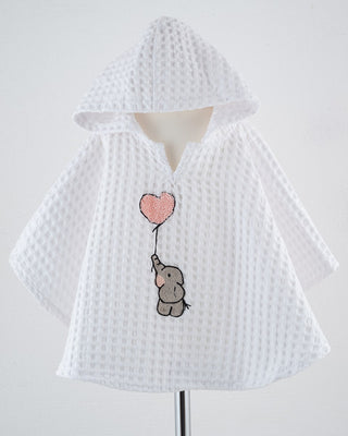 PONCHO MIT ABGERUNDETEN ECKEN