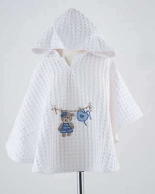 PONCHO MIT ABGERUNDETEN ECKEN
